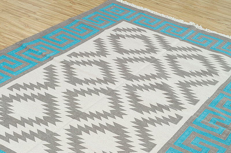 Middle and border white rug